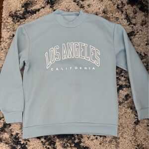 this light blue crew neck is size small and is very comfortable!